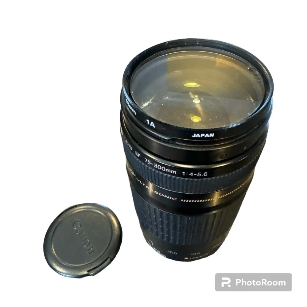 Cannon EF 75-300mm f/4-5.6 Ultasonic compact zoom lens with haze filter